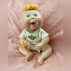 Baby Doll with Orange Pacifier